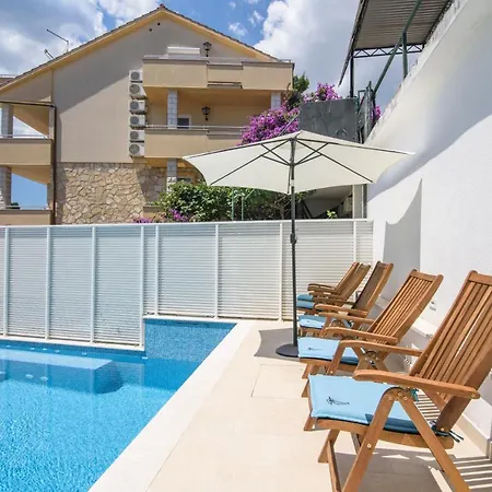 Mastelic With Pool Next To The *