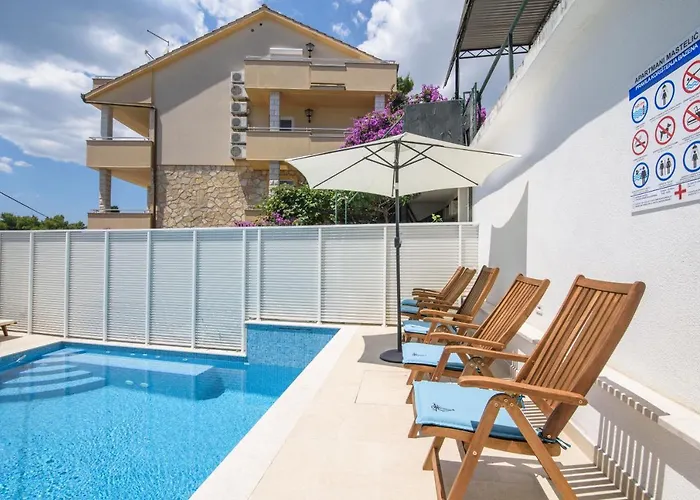 Mastelic With Pool Next To The *